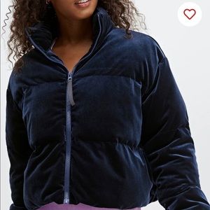 Fabletics Cropped Velour Puffer jacket. Navy, with pockets and carrying strap